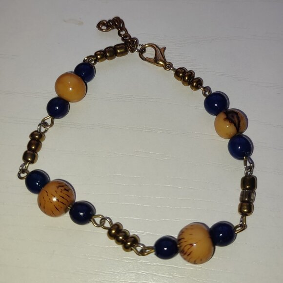 Boho Bracelet Blue and Tan Elegance on antique gold toned background medium - Picture 1 of 9